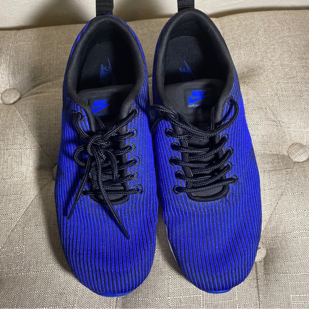 Gently used Nike woman shoe size 8 blue & black